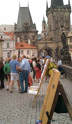 Art and tourists on Charles Bridge